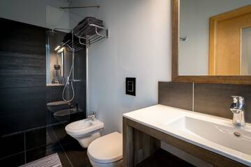 Фото номера Двухместный номер Делюкс с 1 кроватью Отель Hotel Kolumbs г. Лиепая 9