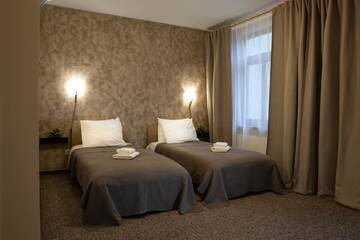 Фото номера Двухместный номер с 2 отдельными кроватями Отель Porins Hotel г. Лиепая 8